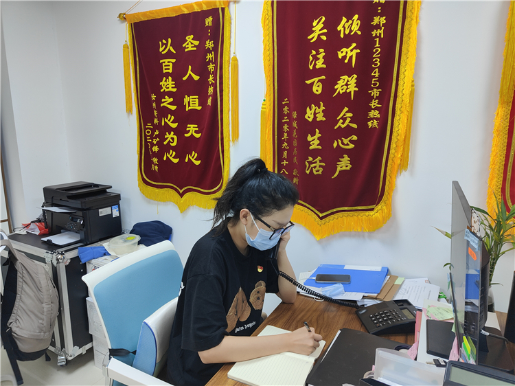 20210723国商学子防汛抗洪显真情,志愿服务践初心 (2).jpg
