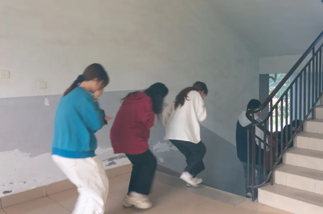 20230318 国际教育学院消防安全知识普及与应急疏散演练 周子洋(摄) (12).jpg